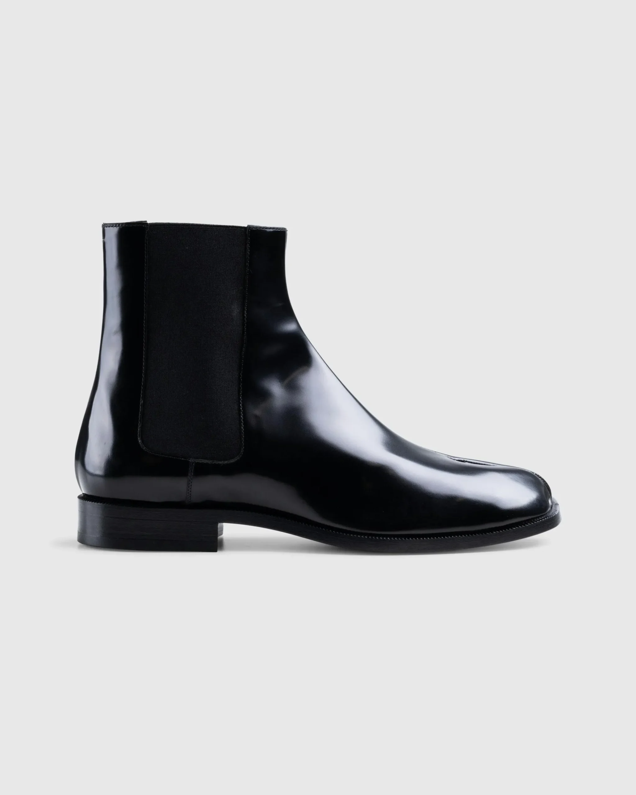 Shop Maison Margiela Leather Tabi Ankle Boot black/washed