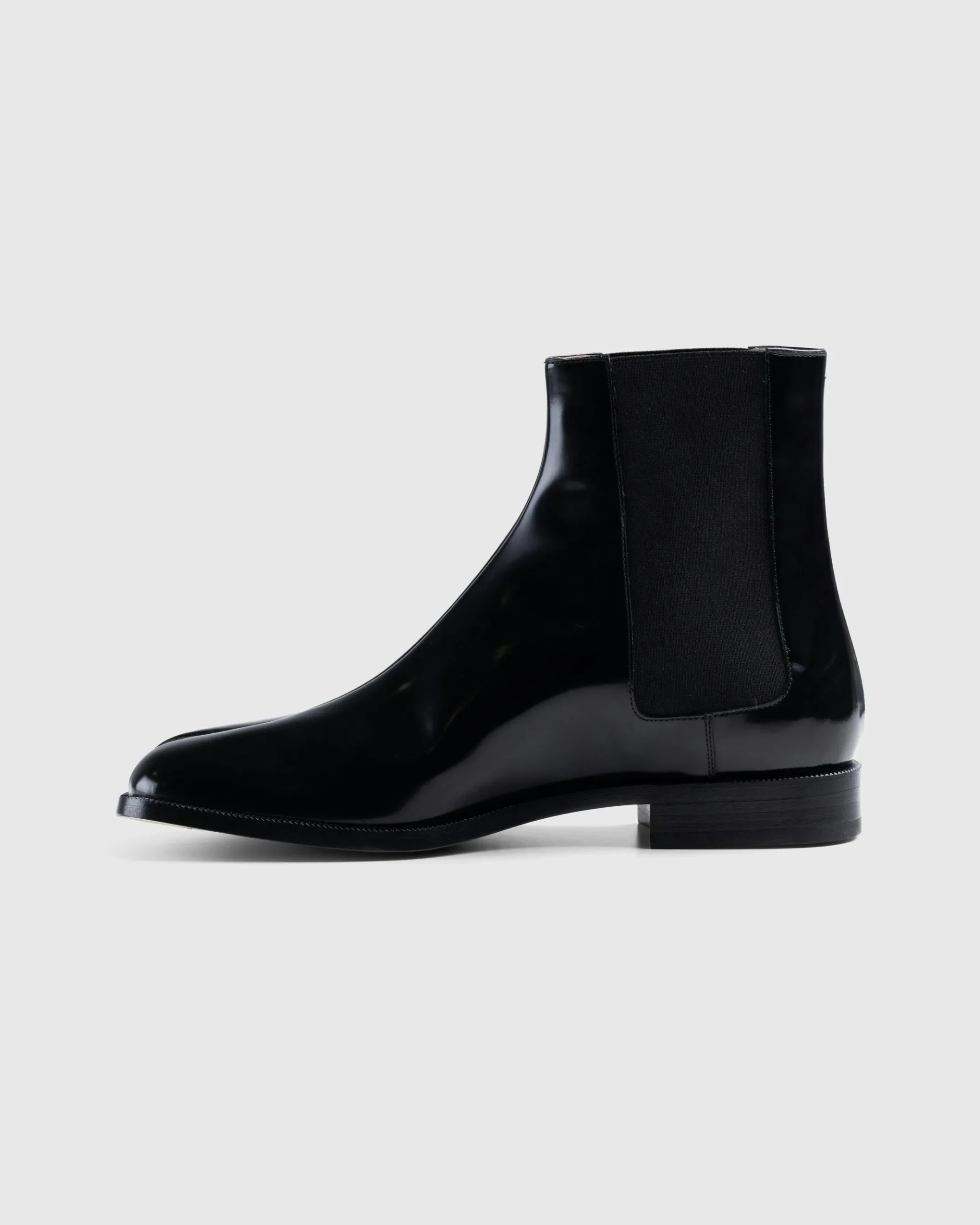 Shop Maison Margiela Leather Tabi Ankle Boot black/washed