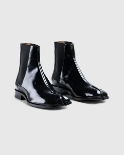 Shop Maison Margiela Leather Tabi Ankle Boot black/washed