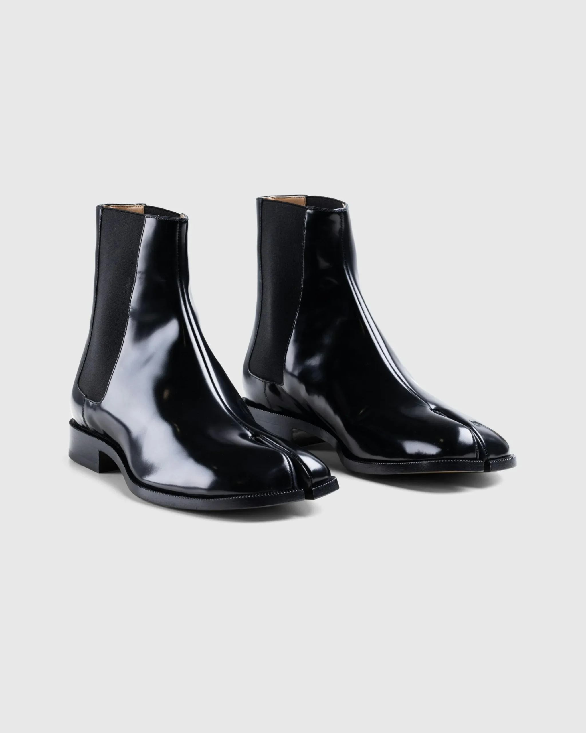 Shop Maison Margiela Leather Tabi Ankle Boot black/washed