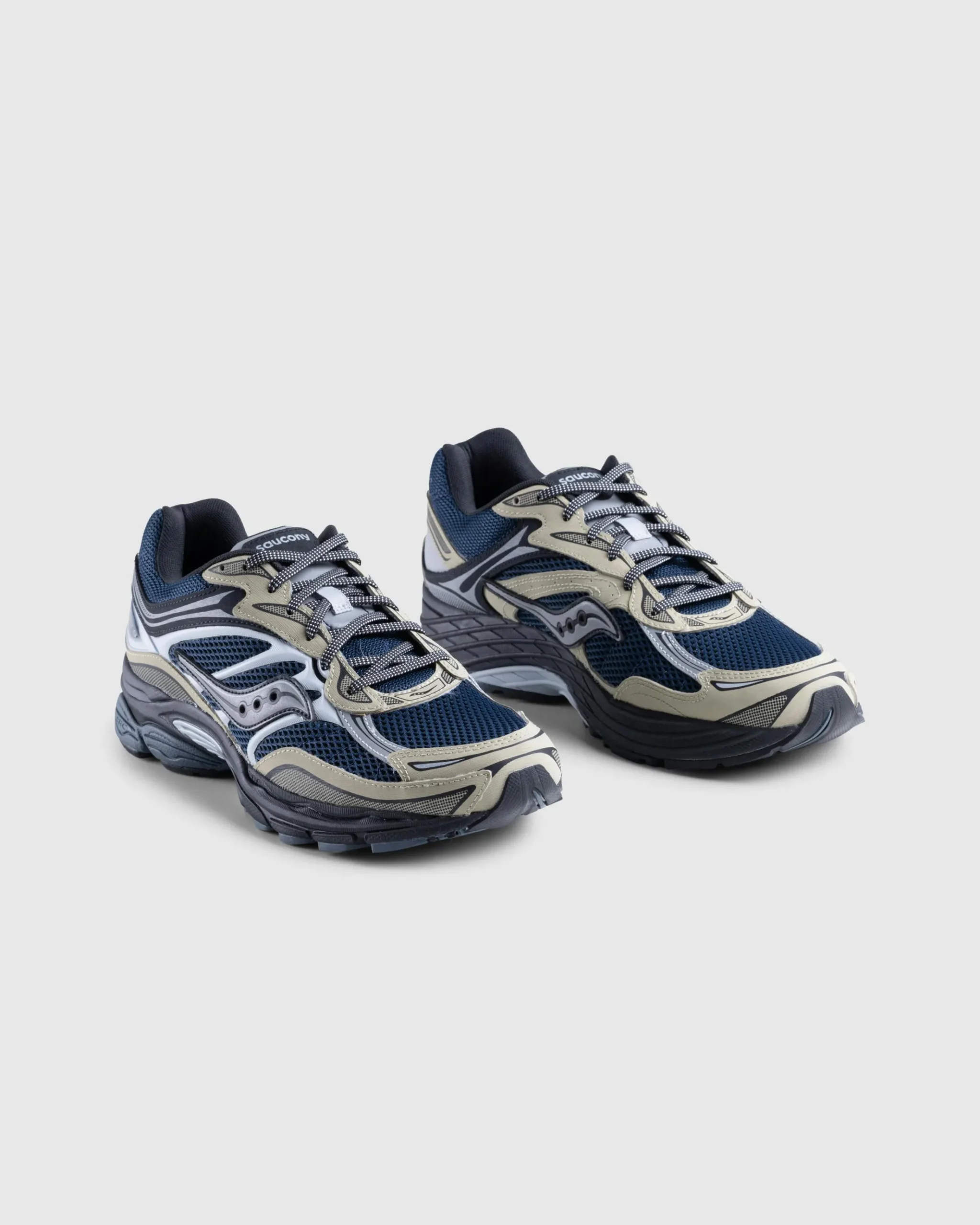 Shop Saucony ProGrid Omni 9 blue/brass