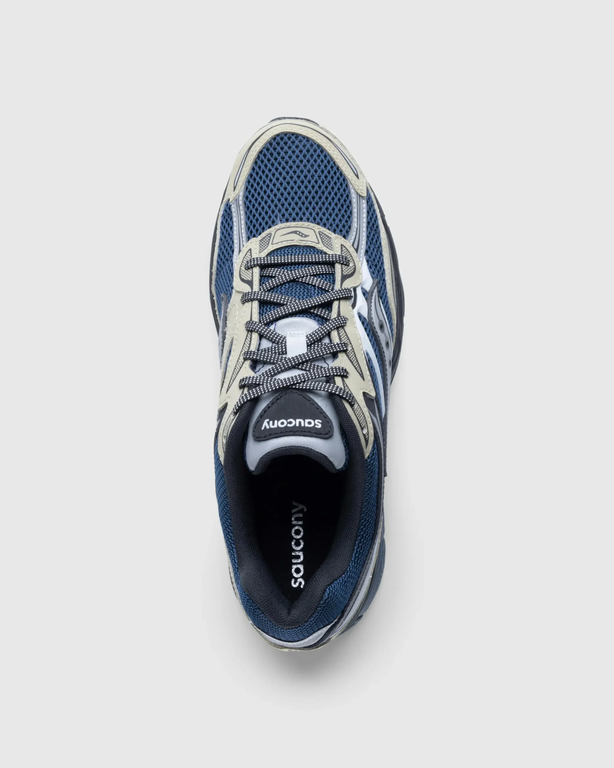 Shop Saucony ProGrid Omni 9 blue/brass